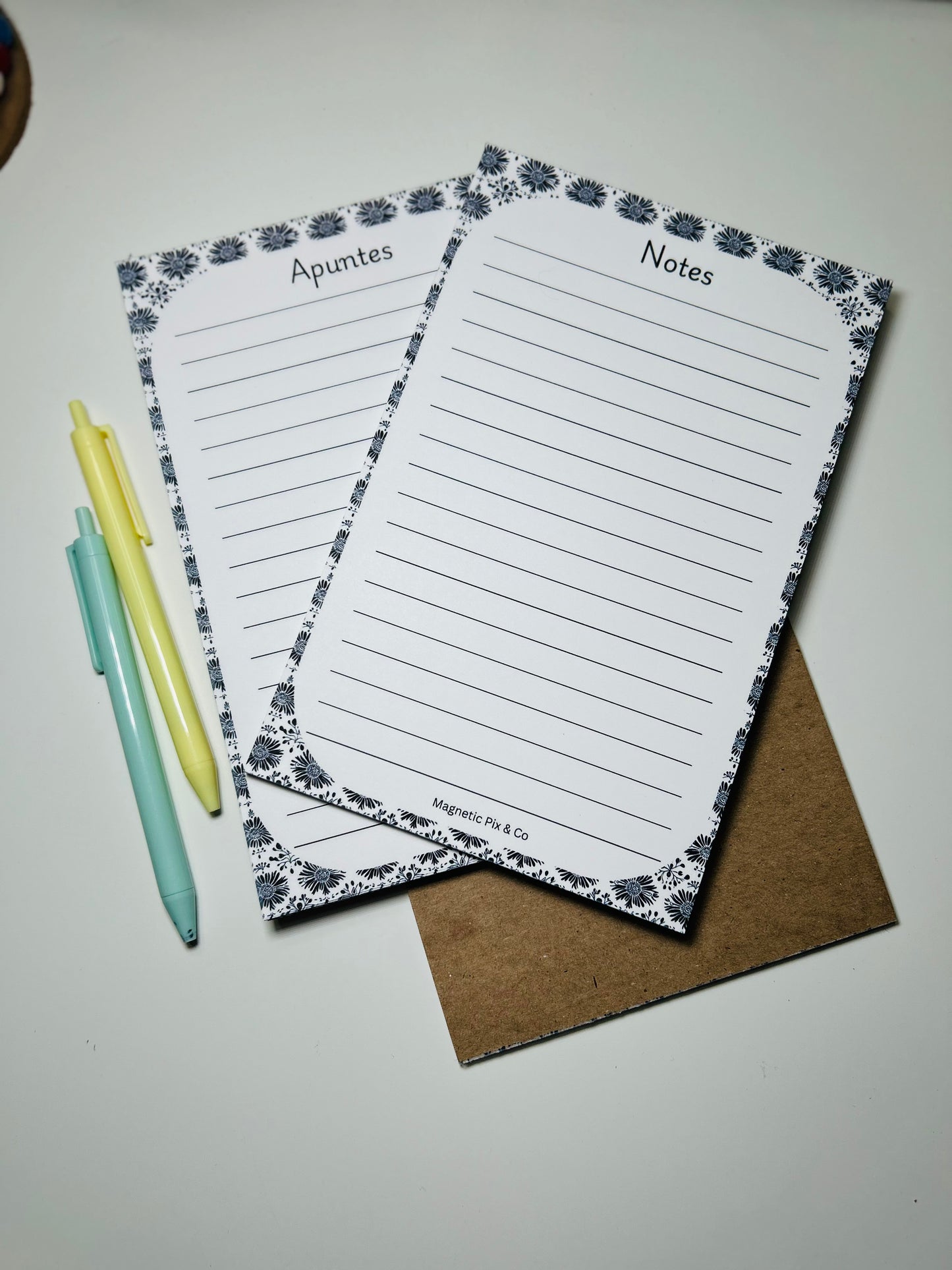 Black floral notepad