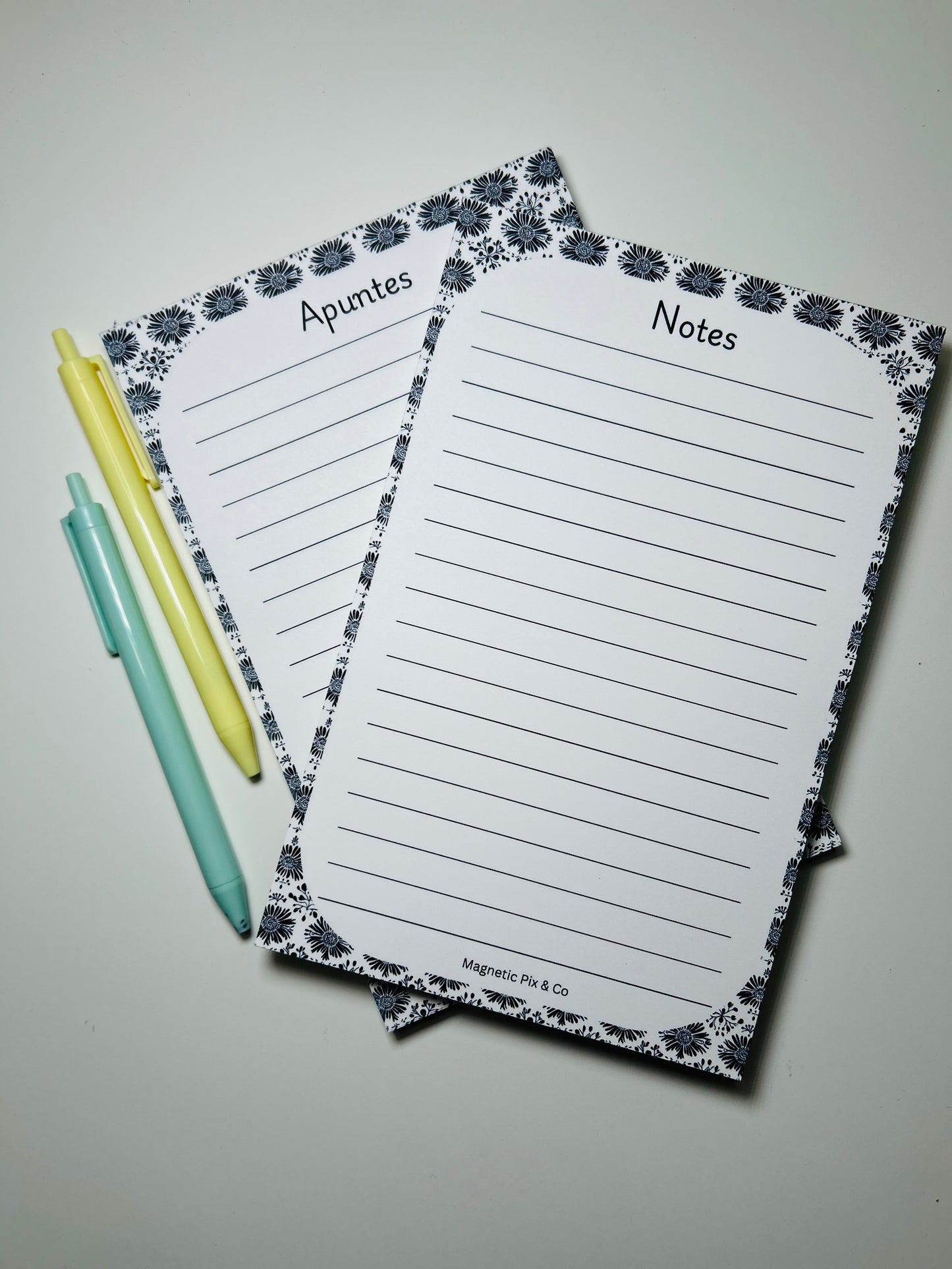 Black floral notepad